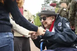 Jake Larson, a WWII veteran who became a TikTok star as 'Papa Jake', has died at 102